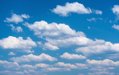 A clear blue sky with fluffy white clouds