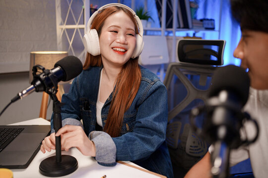 People in the podcast studio talking and recording