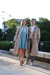 Lovely couple walking together on city street