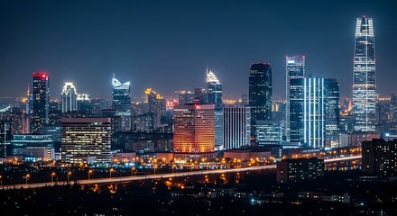 Fototapeta premium Stunning Panoramic View of a Modern Cityscape Illuminated Against the Night Sky