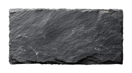 A rectangular piece of dark textured slate stone with rough edges is presented isolated on transparent background