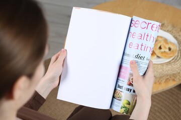 Obraz premium Woman reading magazine indoors, closeup. Mockup for design