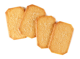 Heap sugar coated cinnamon biscuits isolated on white, top view	