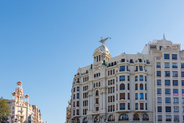 Beautiful architecture seen in Plaza del Ayuntamiento, featuring historic buildings with decorative...