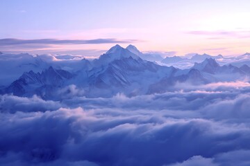 Obraz premium Majestic mountain peaks shrouded in a sea of clouds.