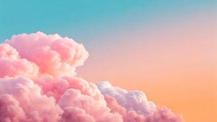 Soft pink clouds in dreamy pastel sky during sunset or sunrise