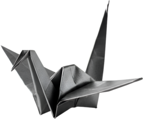 Grey origami crane in a studio setting. Detailed, intricate folds on the paper crane with a black background. Student craft project. educational use -