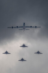 Paris, France - 07 14 2025: Air show of July 14. military planes flying above the district of La Defense