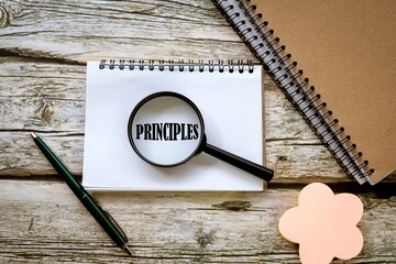 PRINCIPLES symbol. Beautiful wooden table. 