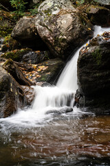 Fototapeta premium Rocky Waterfall in Autumn 