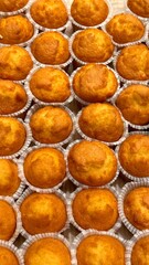 Cupcakes close-up Background. mini maffins on a bakery