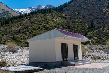 Ala-Archa Park, Small toilet, restroom, bathroom in rugged wilderness, refuge for trekkers and...