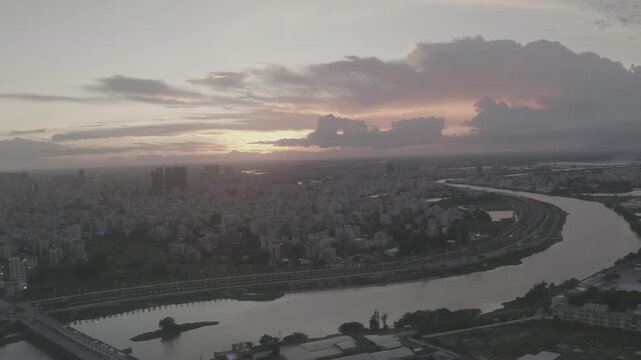 Sunset over Zhanjiang Wuchuan showcasing the rivers and cityscape in stunning colors