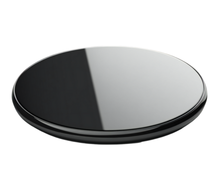 Sleek round wireless charger pad in black and silver, for modern tech, on transparent background