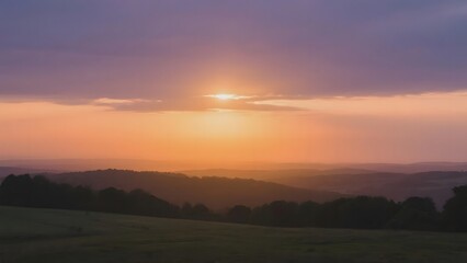 Obraz premium Golden Sunset Over Rolling Hills