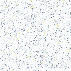 Seamless ink splatter dots pattern artistic blue and yellow spray design