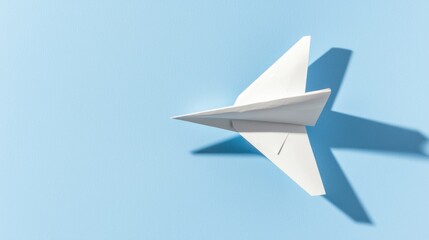 Clean Professional Paper Airplane on Blue Background with Shadow