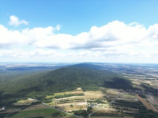 Stunning Mountainous Panorama from Above Dramatic Valley View, Perfect for HighEnergy Campaigns or RelaxationFocused Projects.