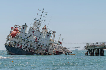 A ship tilts after hitting a dock, Marina di Massa, Italy
