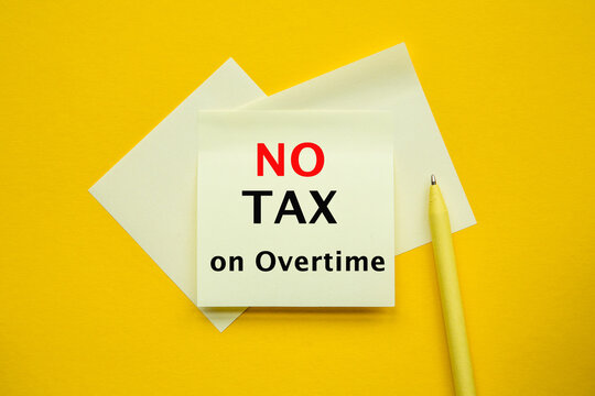 No Tax ON Overtime. TEXT is written on yellow background. Conceptual overtime pay symbol. Copy space.