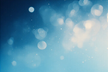 Soft Blue Bokeh Background with Floating Particles.