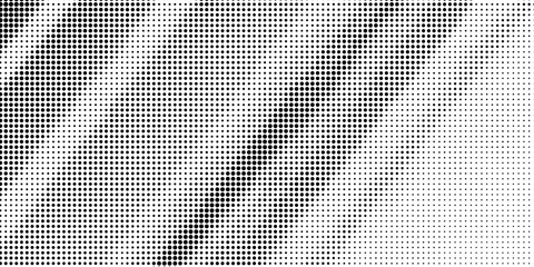 Grunge halftone black and white dots texture background. Spotted Abstract Texture