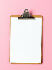 Blank clipboard with metal clip and white paper on pink background, creating minimal and professional look