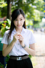 The cute college student, recognized for her classic Asian look, spent time posing for photos...