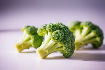 Raw broccoli on clean minimal background with copy space