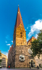 Picturesque view of the west side of the famous Church of Our Lady (German: Kirche Unser Lieben Frauen) with the north tower in the city centre of Bremen.