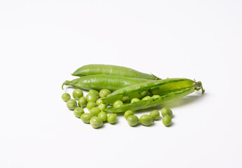 Pods of fresh green peas on a white background. Isolated