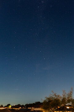 Starry night sky in light polluted urban area seen from NSW Australia