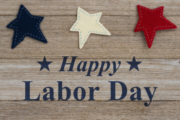 Happy Labor Day with retro USA red, white and blue stars on weathered wood