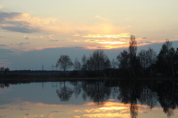 Fototapeta premium sunset over the river