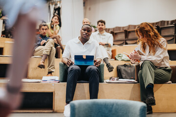 Several people collaborate in a relaxed environment, fostering creativity, teamwork, and...