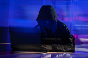 Hackers work in secret, secret rooms, mysterious lights using computers or laptops, penetrating...