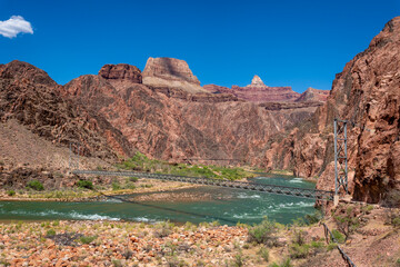 Bright Angel Trail Bridge from South Bank of Colorado River on Sunny Day