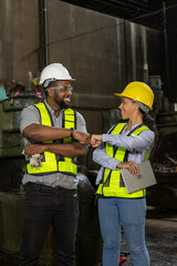 African American Project Engineer train male and female Inspect the train's diesel engine, railway track in depot of train and have fist bump after job done.