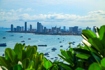 The Khao Phra Tamnak Viewpoint is a popular attraction in Pattaya, located on Phra Tamnak Hill. It offers stunning views of the city, the blue sea, blue sky, and numerous boats docked in Pattaya Bay