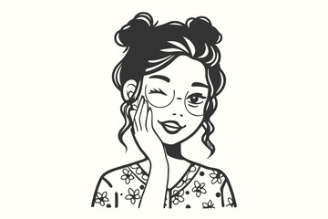 Winking girl with round glasses and space buns touches her face smiling playfully