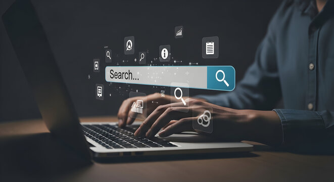 Person typing on a laptop with search and digital navigation icons visible on the screen, symbolizing digital research and online data retrieval in the modern workspace.