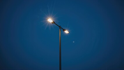 Streetlight illuminated at night
