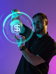 Focused man holding digital dollar icon in glowing financial HUD interface. Concept of mobile banking, fintech interface, finance visualization, and virtual economy platforms.