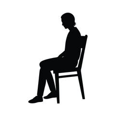 Fototapeta premium Silhouette of a person sitting on a chair.