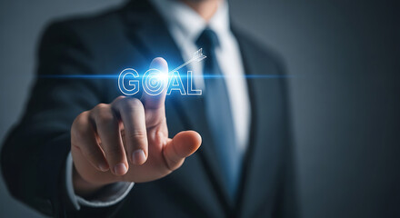 Fototapeta premium Businessman Hand Touching Goal Target Arrow image