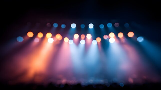 blurred image of a concert stage or event setup, colored lighting and stage shapes, dramatic aesthetic - Powered by Adobe