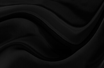 Black gray satin dark fabric texture luxurious shiny that is abstract silk cloth background with patterns soft waves blur beautiful.