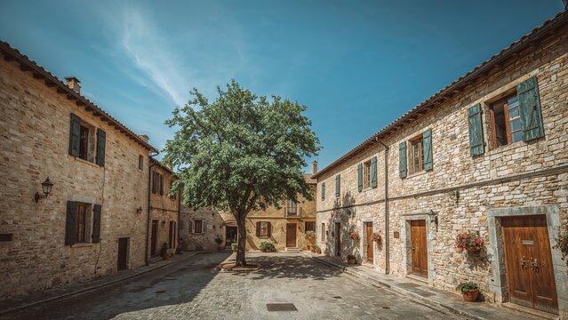 Homes positioned around a classic plaza in a medieval community