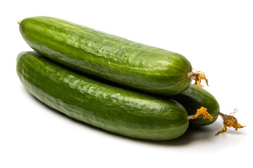 Photo of a small bunch of green natural organic cucumbers isolated on white background