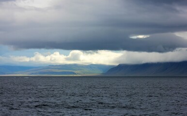 storm clouds over the sea, iceland